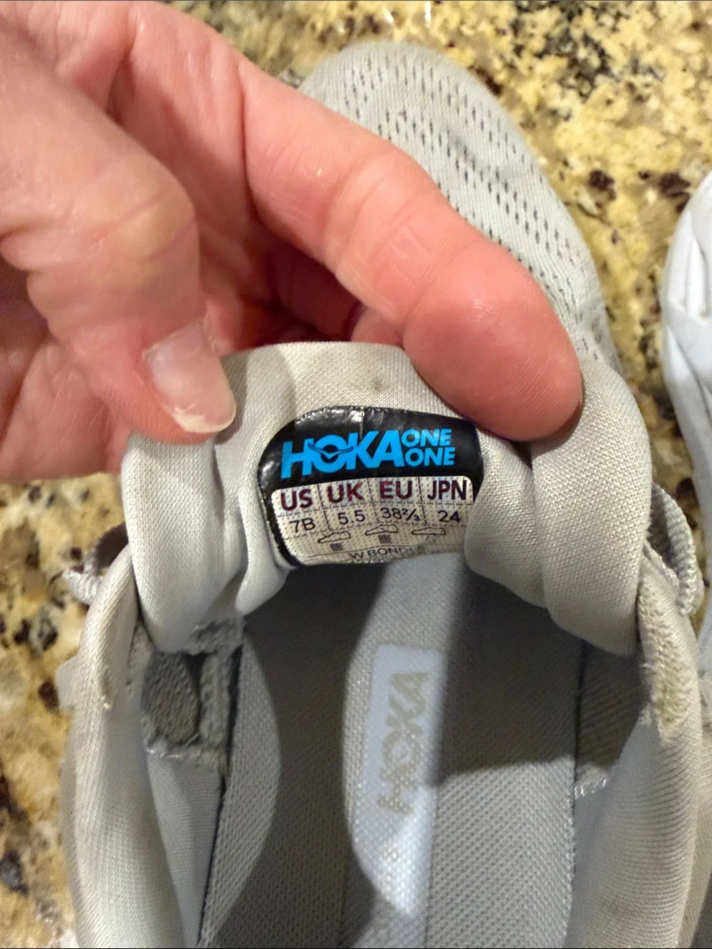 Hoka Women's Running Shoes in Light Gray with Subtle Peach Accents